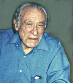 Foto colorida de Charles Bukowski já idoso, de cabelos grisalhos